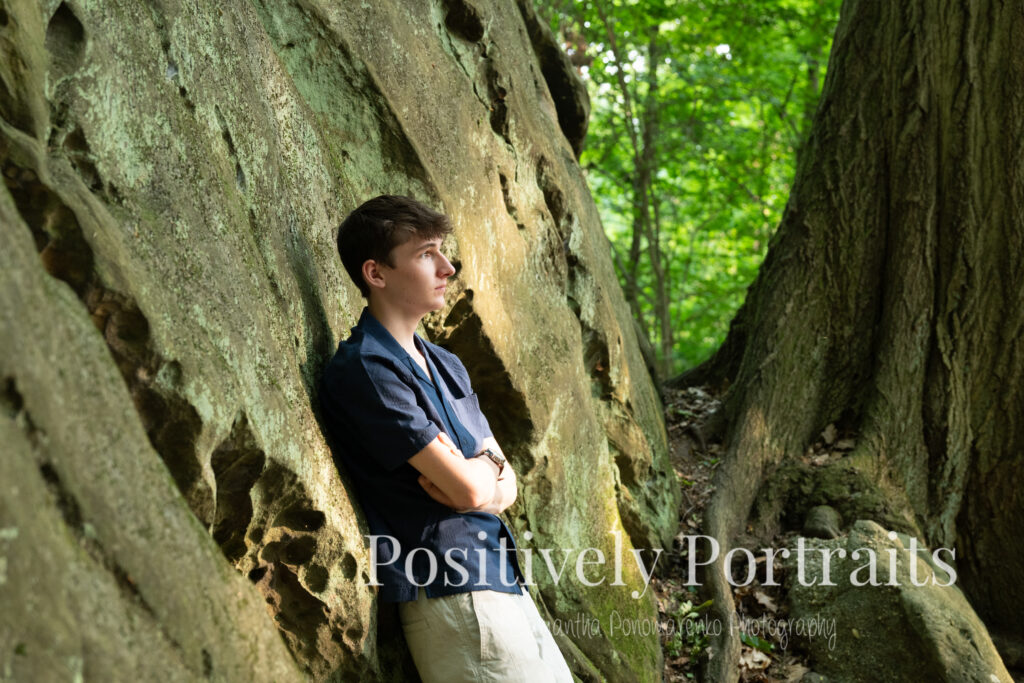 This senior session was the perfect mix of strength, style, and personality. The mix of weathered stone and rich greenery at Whipps Ledges creates a timeless setting for capturing lasting memories. Cameron brought it all: classic looks, meaningful details, and genuine confidence.