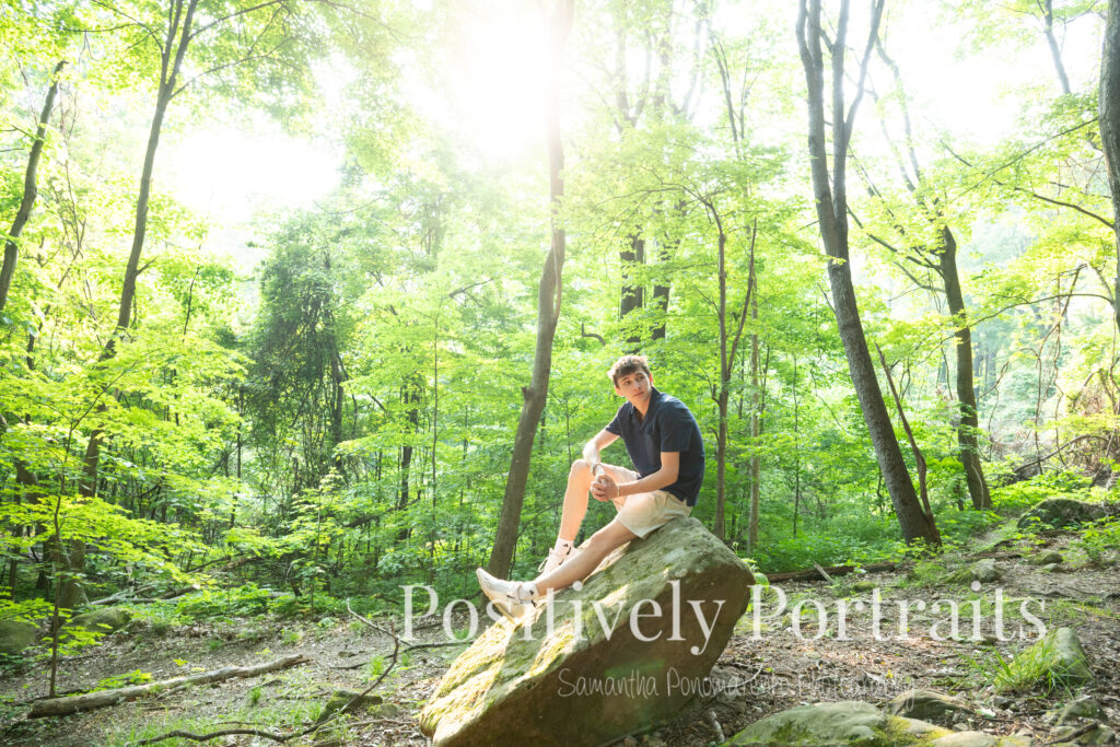 This senior session was the perfect mix of strength, style, and personality. The mix of weathered stone and rich greenery at Whipps Ledges creates a timeless setting for capturing lasting memories. Cameron brought it all: classic looks, meaningful details, and genuine confidence.