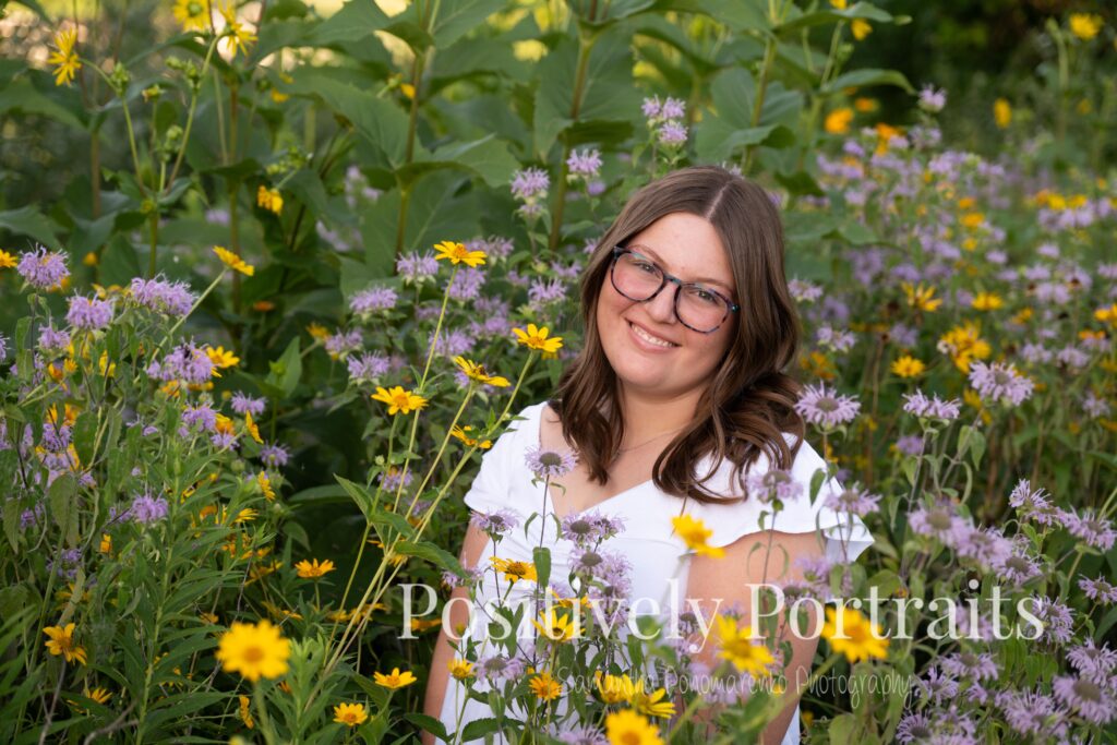 Next, Tabitha kept things classic with a white blouse and blue jeans. This simple, polished look gave us relaxed and natural portraits as we explored the flower patches and scenic trails.