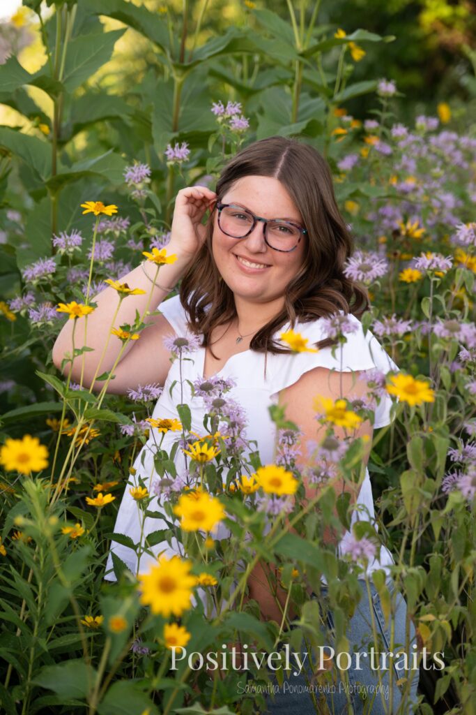 Next, Tabitha kept things classic with a white blouse and blue jeans. This simple, polished look gave us relaxed and natural portraits as we explored the flower patches and scenic trails.