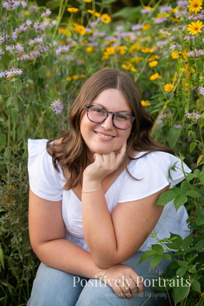 Next, Tabitha kept things classic with a white blouse and blue jeans. This simple, polished look gave us relaxed and natural portraits as we explored the flower patches and scenic trails.