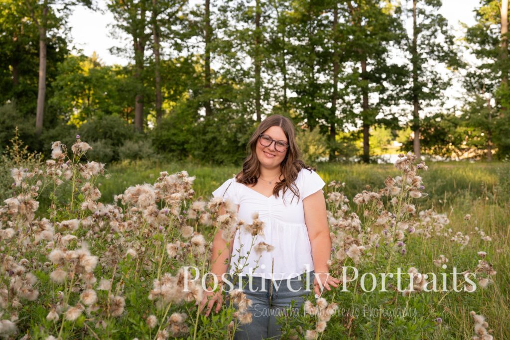 Next, Tabitha kept things classic with a white blouse and blue jeans. This simple, polished look gave us relaxed and natural portraits as we explored the flower patches and scenic trails.